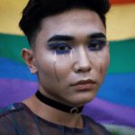 Person of the LGBTQ+ struggling with getting over their trauma