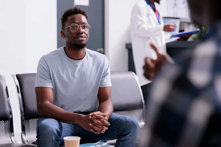 man speaking to therapist - drug addict freebasing