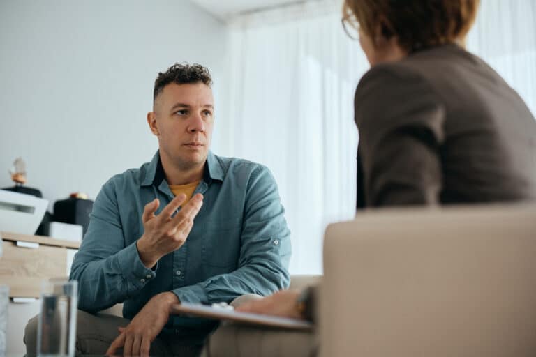 gay man speaking with therapist during drug detox - detoxing from drugs at home